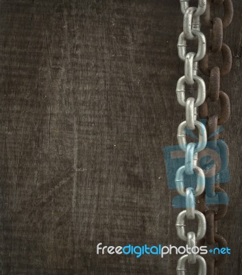 Rusty Chain And Wood Background Stock Photo