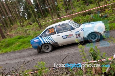 S. Benskin Driving Ford Escort Stock Photo