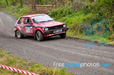 S. Mcgirr Driving Toyota Starlet Stock Photo