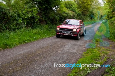 S. Mcgirr Driving Toyota Starlet Stock Photo