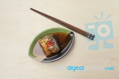 Saba In Teriyaki Sauce On Wood Background Stock Photo