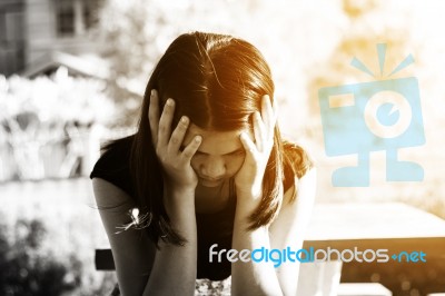 Sadness Girl Sitting Alone Stock Photo