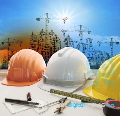 Safety Helmet On Architect ,engineer Working Table With Modern B… Stock Photo