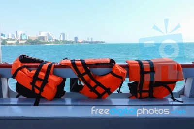 Safety Life Vests Hanging On Ferry Boat Stock Photo