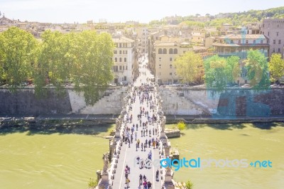 Saint Angel Bridge Over The River Tiber With Tourists Stock Photo