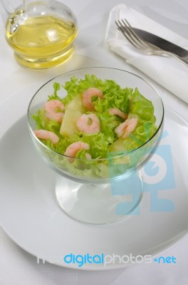 Salad Of Pineapple And Shrimp In Lettuce Leaves Stock Photo