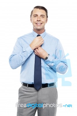 Sales Representative Adjusting His Tie Before The Meeting Stock Photo