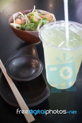 Salmon Spicy Salad And Cold Green Tea Drink Stock Photo