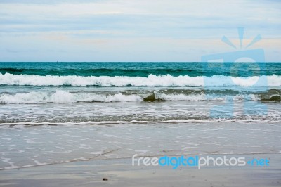 Sand Beach With Blue Ocean Stock Photo