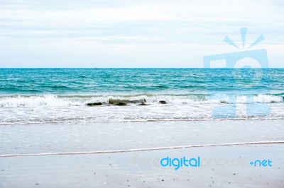 Sand Beach With Blue Ocean Stock Photo