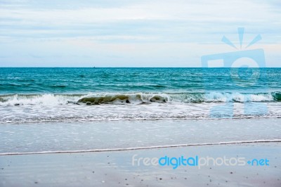 Sand Beach With Blue Ocean Stock Photo