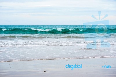 Sand Beach With Blue Ocean Stock Photo