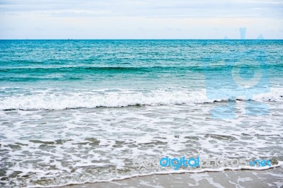 Sand Beach With Blue Ocean Stock Photo