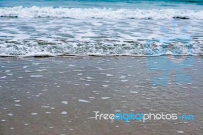 Sand Beach With Blue Ocean Stock Photo