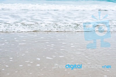 Sand Beach With Blue Ocean Stock Photo