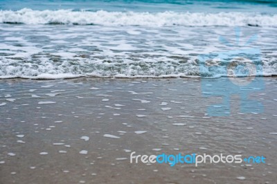 Sand Beach With Blue Ocean Stock Photo