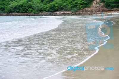 Sand Beach With Blue Ocean Stock Photo