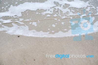 Sand Beach With Blue Ocean Stock Photo