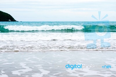 Sand Beach With Blue Ocean Stock Photo