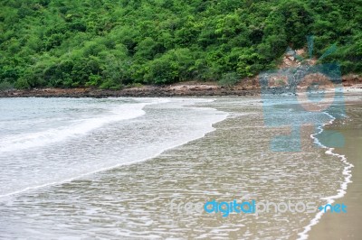 Sand Beach With Blue Ocean Stock Photo