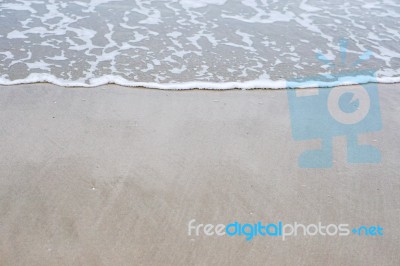 Sand Beach With Blue Ocean Stock Photo