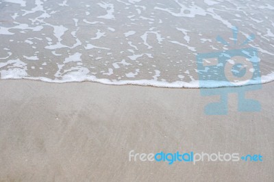 Sand Beach With Blue Ocean Stock Photo