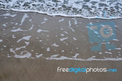 Sand Beach With Blue Ocean Stock Photo