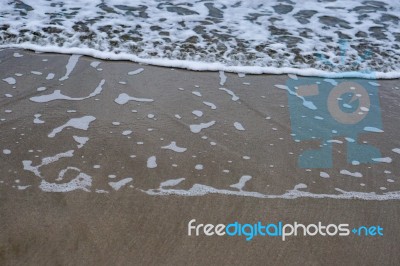 Sand Beach With Blue Ocean Stock Photo