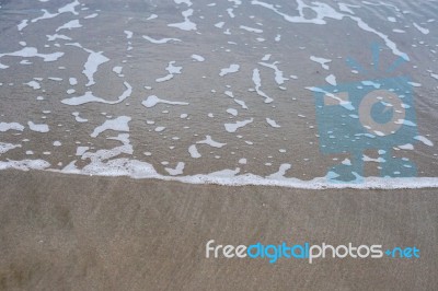 Sand Beach With Blue Ocean Stock Photo