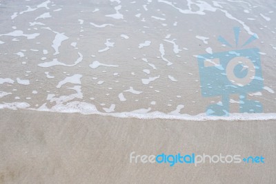 Sand Beach With Blue Ocean Stock Photo