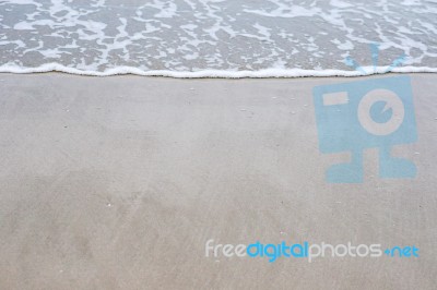 Sand Beach With Blue Ocean Stock Photo