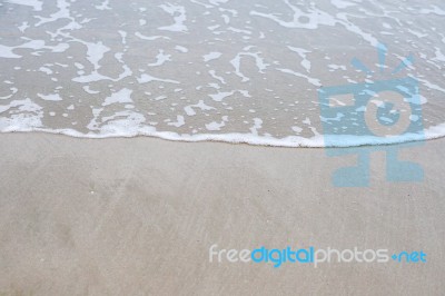 Sand Beach With Blue Ocean Stock Photo