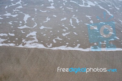 Sand Beach With Blue Ocean Stock Photo