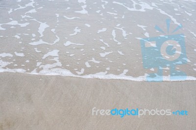 Sand Beach With Blue Ocean Stock Photo