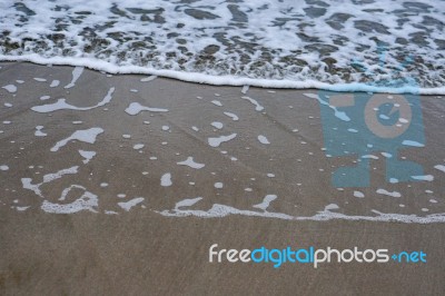 Sand Beach With Blue Ocean Stock Photo