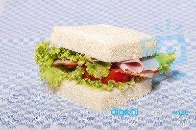 Sandwich With Ham And Lettuce Stock Photo