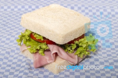 Sandwich With Ham And Lettuce Stock Photo