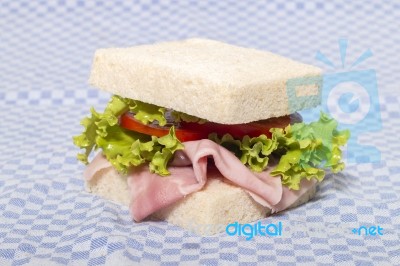 Sandwich With Ham And Lettuce Stock Photo