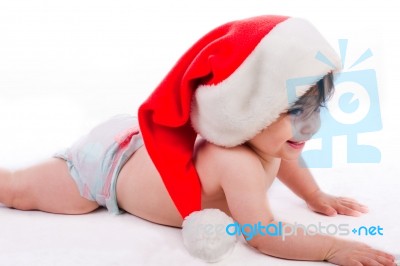 Santa Baby Trying To Crawl Stock Photo