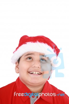 Santa Boy Looking Up Stock Photo