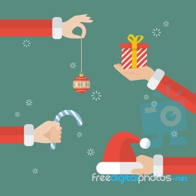 Santa Claus Hand Holding Christmas Objects Stock Image