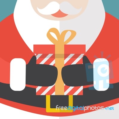 Santa Claus Holding A Christmas Gift Stock Image