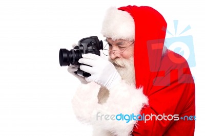 Santa Claus Taking Photo By Camera Stock Photo