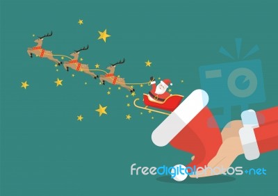 Santa Claus With Reindeer Sleigh Flying Out Of The Santa Hat Stock Image