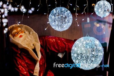 Santa Claus With White Light Balls Stock Photo