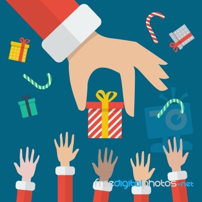 Santa Hand Giving Christmas Gift Box Stock Image