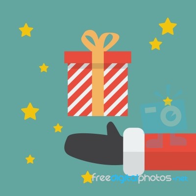 Santa Hand With Christmas Gift Box Stock Image