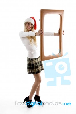 Santa Hat Female Holding Frame Stock Photo