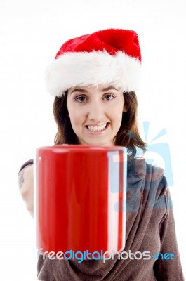 Santa Hat Woman Holding Cup Stock Photo