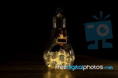 Santa Sign With Christmas Lights In Glass Light Bulb Stock Photo